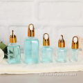 Botellas de vidrio de suero de aceite cuadrado vacío personalizado